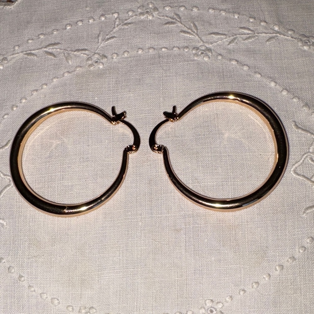 Gold Hoop Earrings $9